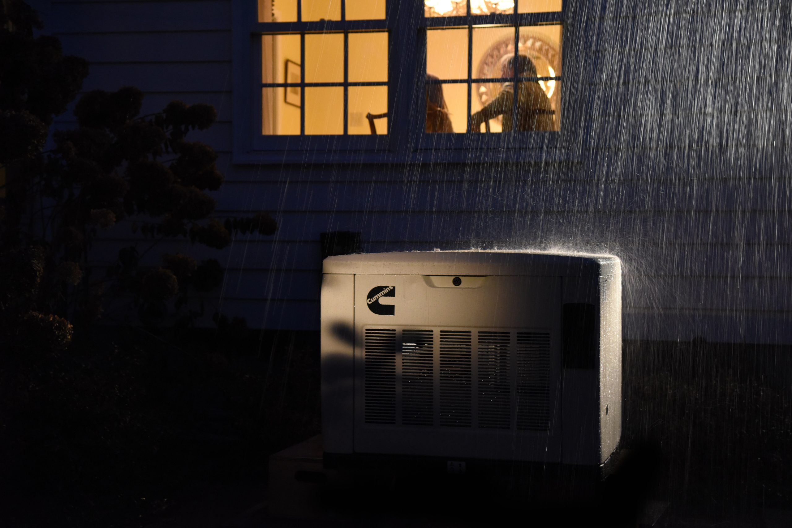 cumminss-generator-outside-rain