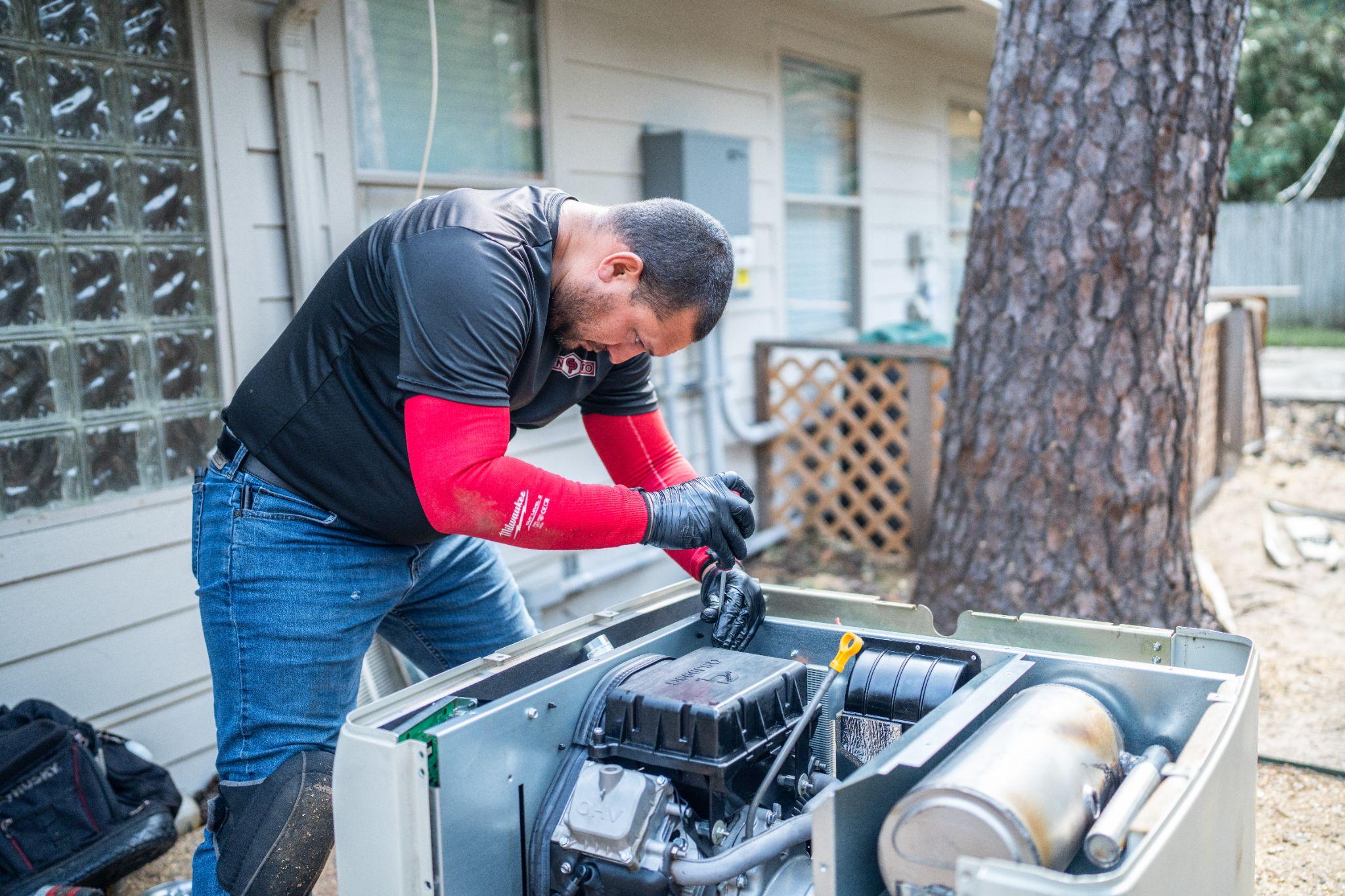 genpro-employee-installing-generator